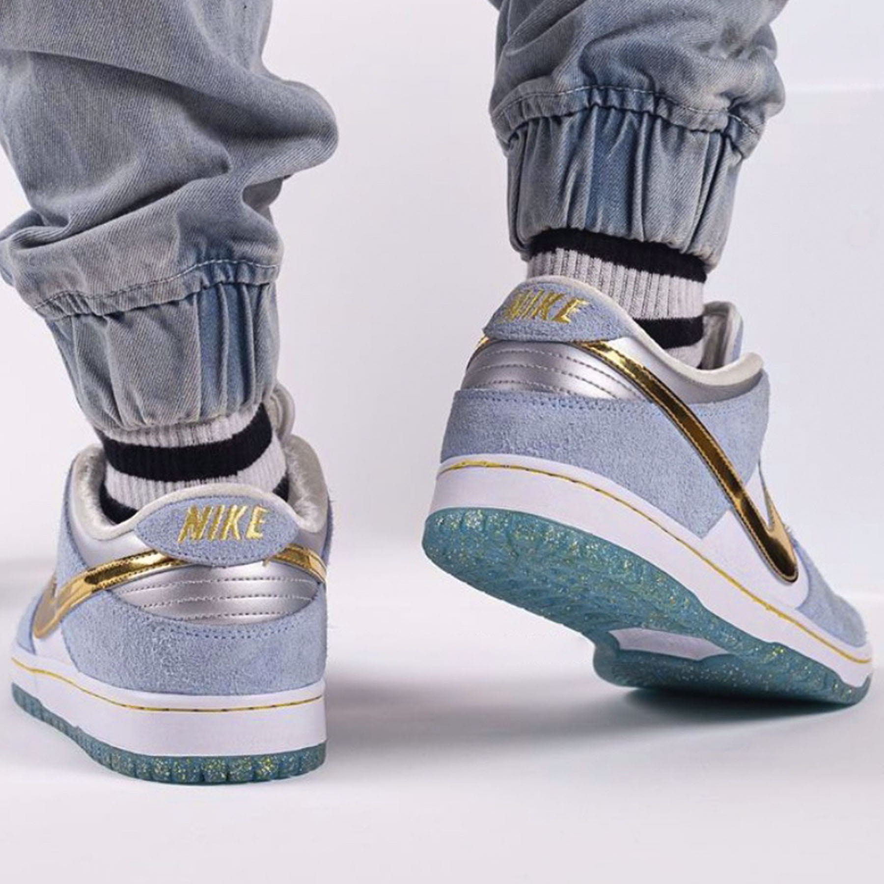 Sean Cliver x Nike Dunk Low SB 'Holiday Special' - Kick Game